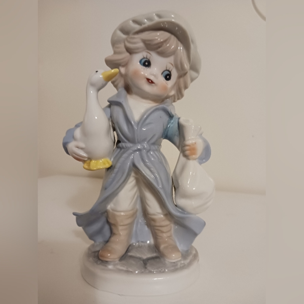 Charming Ceramic Figurine with Goose